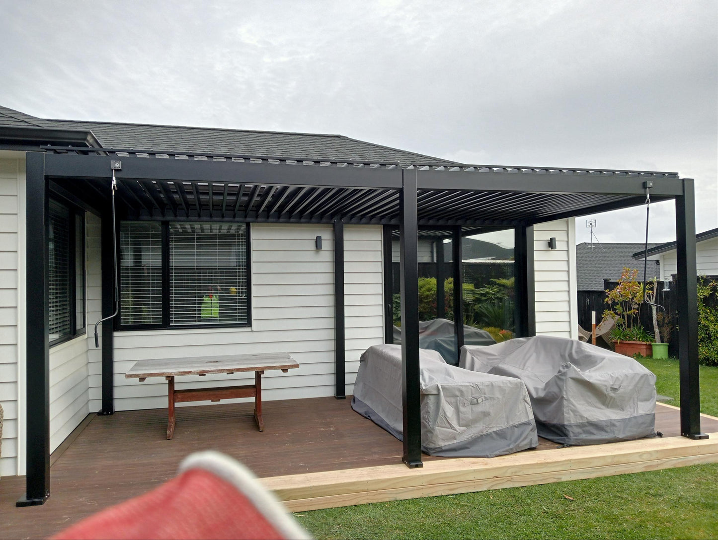 Stellaris Manual Series Wall Mounted Louvre Roof Aluminium Pergola